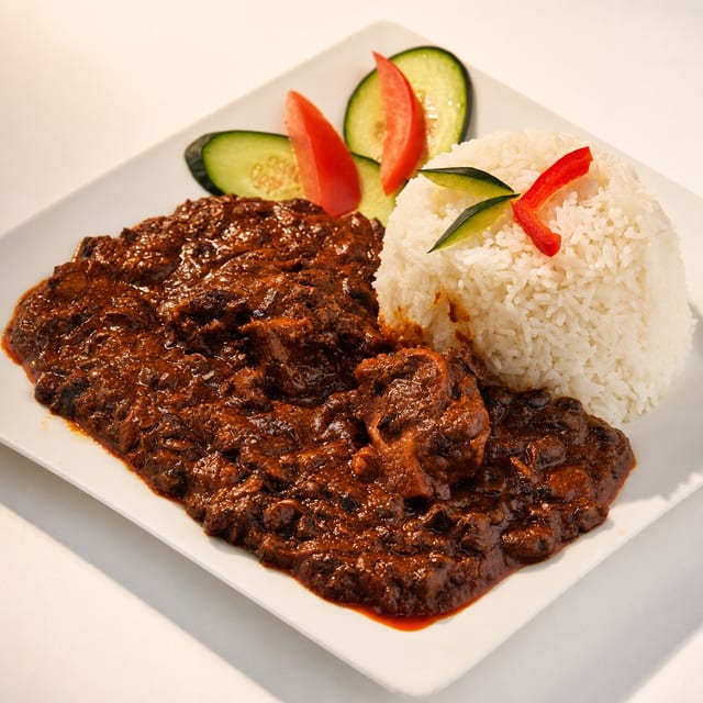 Bean Toborgee Served with Rice.